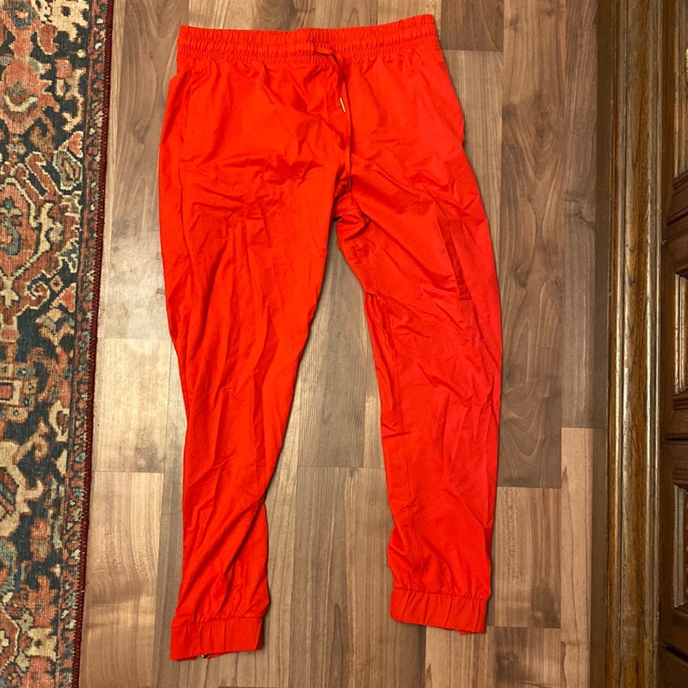 Red Everywhere zipper joggers
